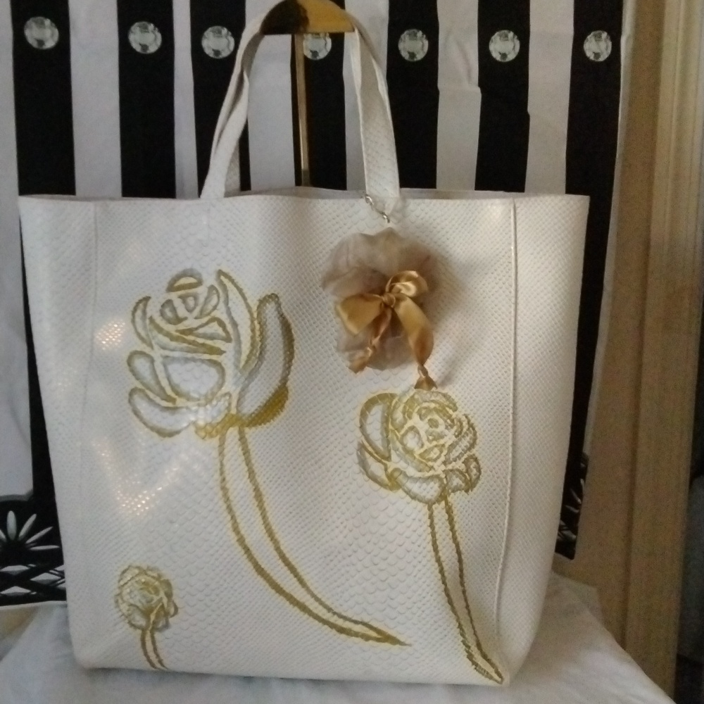Tote bag with embellishments and purse charm